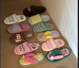 Colorful Farfary slippers styled together at home