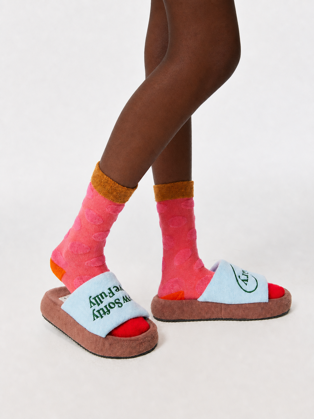 Farfary blue and brown color-block slides styled with colorful socks